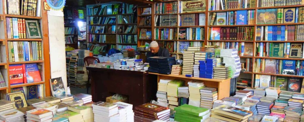 Traditional library filled with books on Al-Mutanabbi Street in Baghdad, Iraq, the city's historic center for literature and culture.