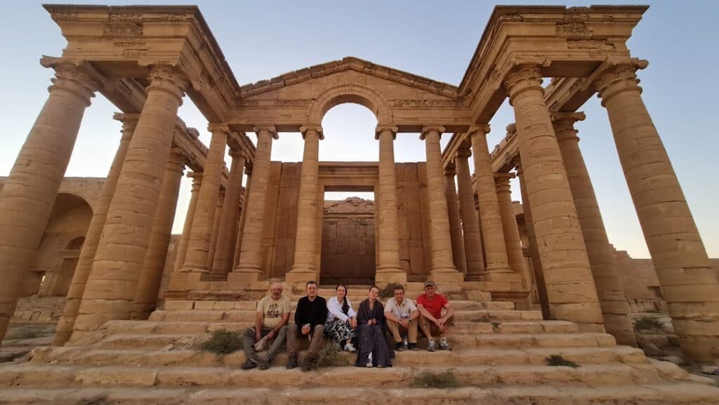group of tourists in hatra during a group tours to iraq