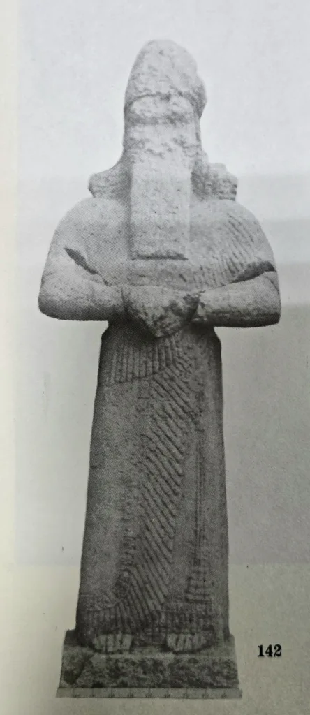 Gigantic limestone statue of the god 'Nabu', grand Assyrian god known for his knowledge and wisdom, found near the Nabu Temple at Nimrud, datable to 8th century B.C.