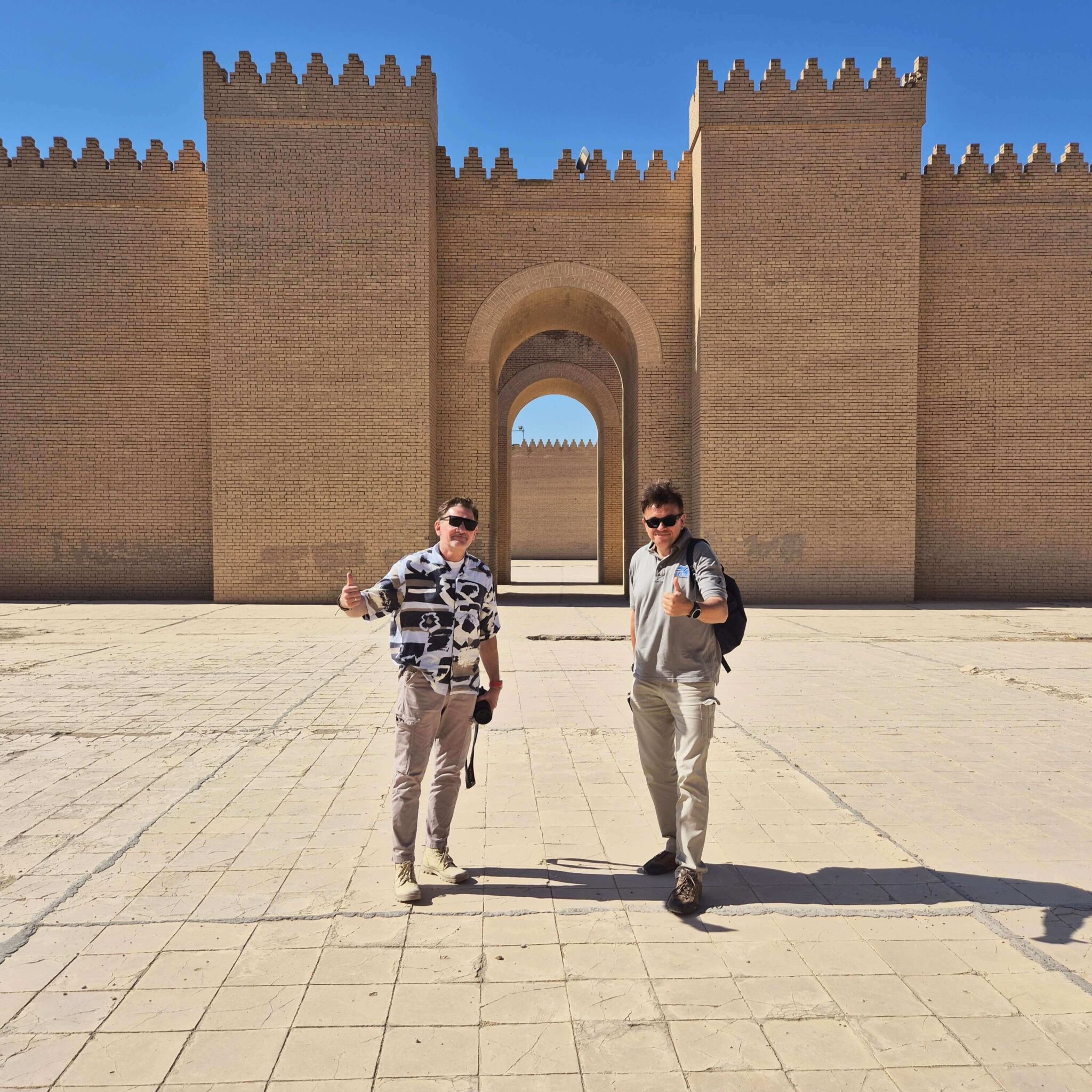 Tourist taking a photo during private tours to Iraq at a historic site