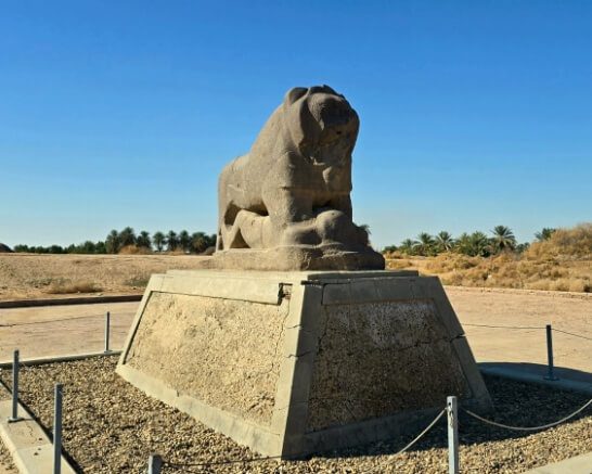 The Lion of Babylon, an ancient basalt statue from Mesopotamian civilization symbolizing strength and protection, located in the historic city of Babylon and a popular stop on Iraq group tours exploring the country’s archaeological heritage.