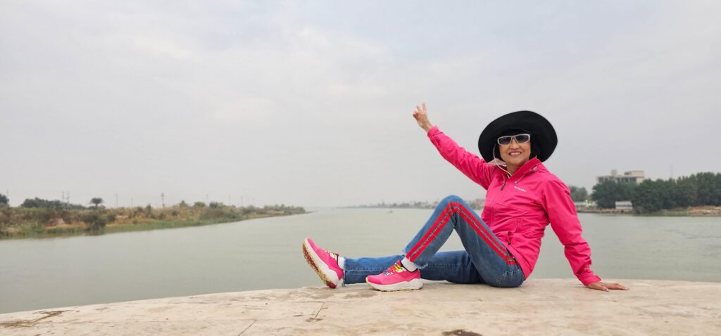 Tourist enjoying river landscape during private tours to Iraq experience