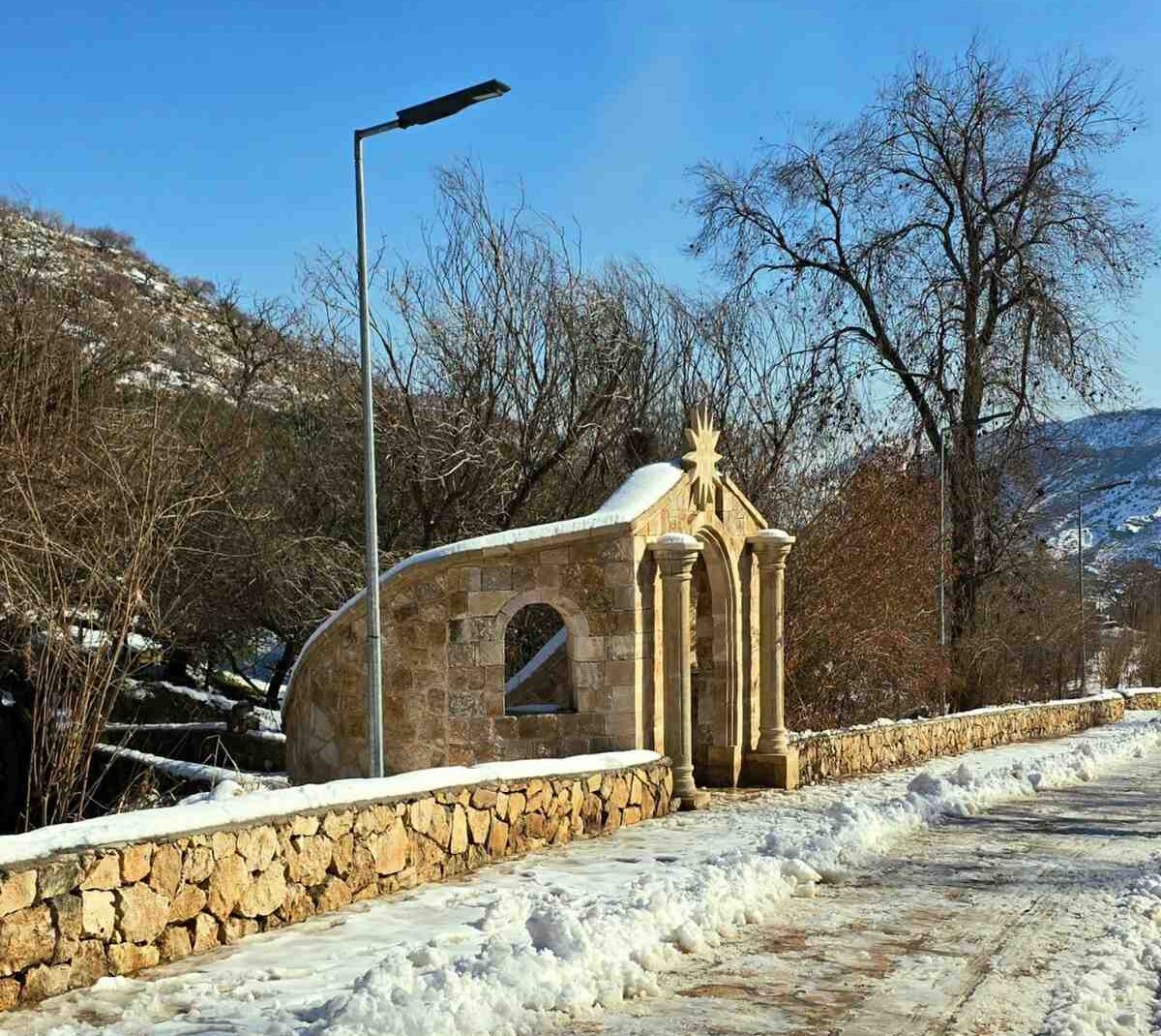 Lalish, the sacred religious center of the Yazidi community in Iraq, featuring ancient temples, traditional stone pathways, and the peaceful mountain surroundings of this important cultural and spiritual site near Duhok in Kurdistan, Iraq