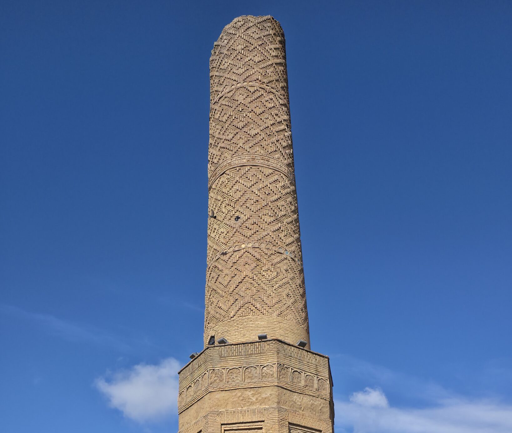 The Choli Minaret in Erbil, Iraqi Kurdistan, a historic 12th-century Islamic architectural landmark surrounded by a cultural park, representing medieval heritage and history in northern Iraq.