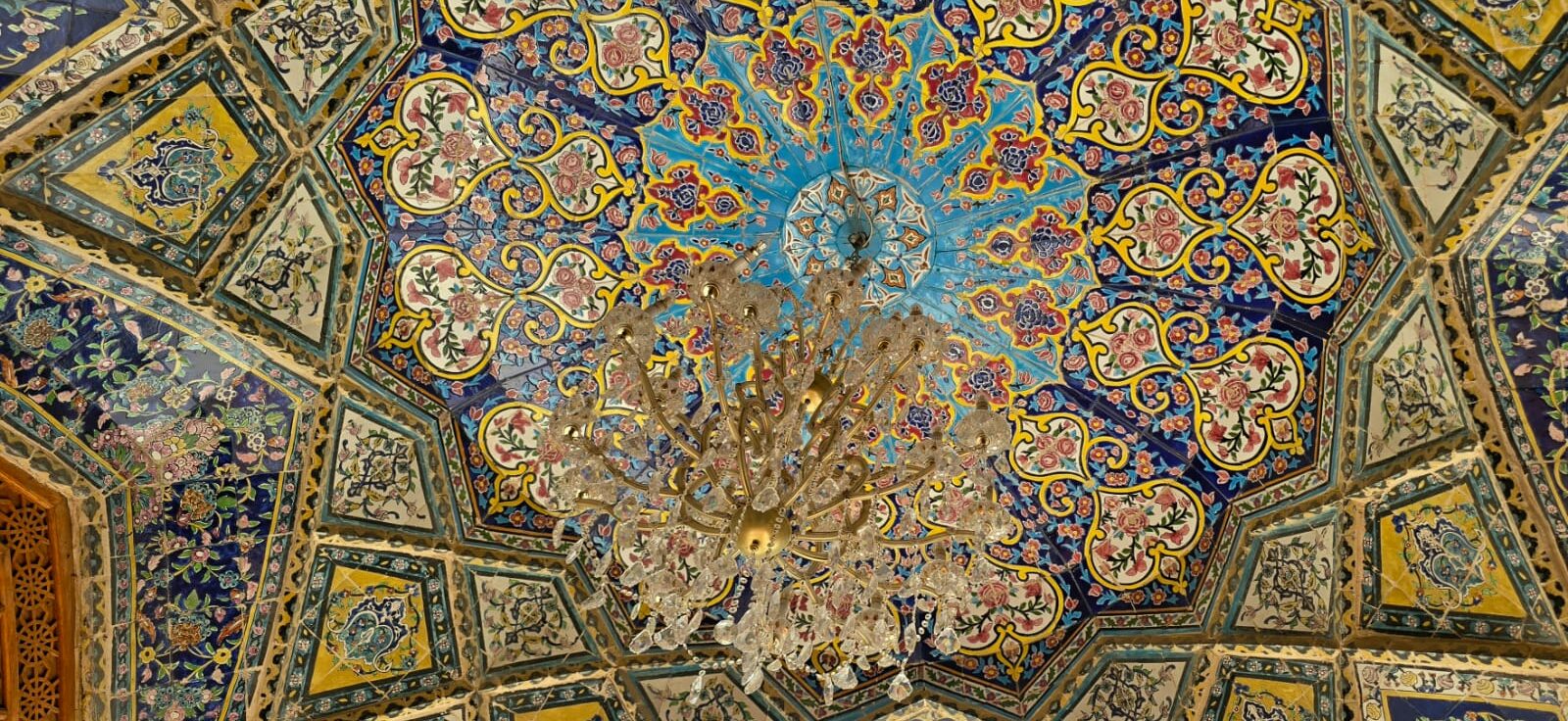 Close-up of the intricate Islamic architecture and decorative details at the Imam Al-Kadhim Holy Shrine in Baghdad, Iraq.