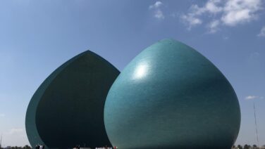 Al-Shaheed Monument in Baghdad, the turquoise split-dome memorial honoring Iraqi soldiers