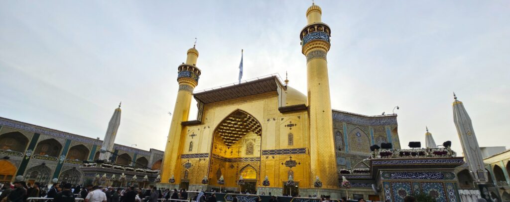 Imam Ali Holy Shrine in Najaf, Iraq, featuring its magnificent golden dome, ornate minarets, and richly decorated courtyard, one of the country’s most significant religious landmarks.
